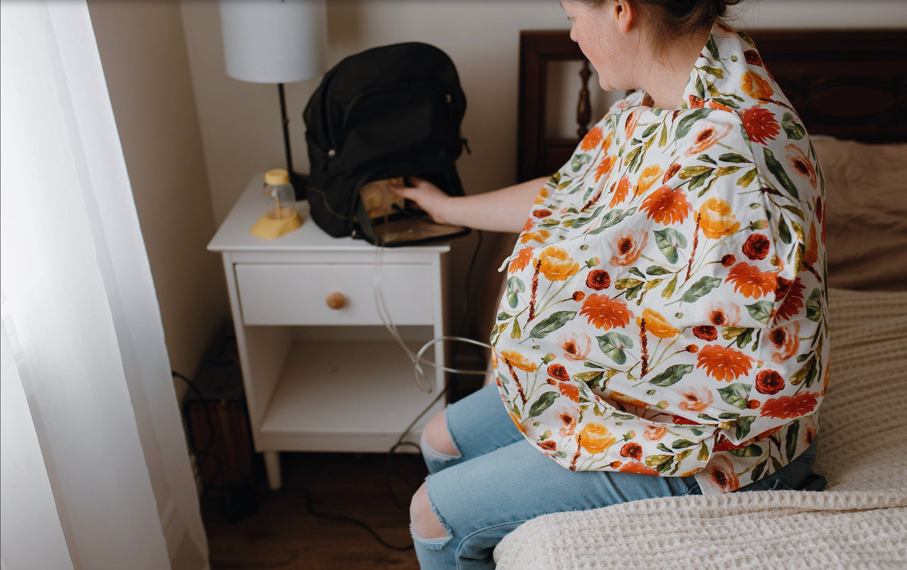 a woman breastfeeding her baby